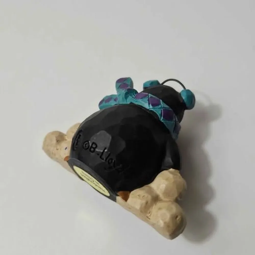 B. Lloyd Penguin Figurine 